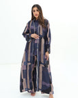 Full-length view of Abstract Block Print Linen Blend Open Abaya layered over matching shirt and trousers by Gharza Couture
