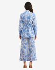 Back view of the Azure Blossom Pleated Linen Co-ord Set highlighting the adjustable back waist belt, pleated design and lined wide-leg linen trousers.