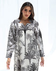 Black Palm Escape Hand Embellished Jalabiya showing star neckline and botanical print