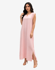 Women's blush pink sleeveless crepe satin maxi dress with side slits, designed as an elegant inner dress for open abayas and modest fashion.