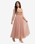 Full-length view of the Celestial Bloom Hand Embellished Blush Pink Tulle Evening Dress showcasing its flowing pleated skirt and elegant silhouette.