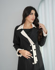 Half-body view of Contrast Lapel Abaya showcasing contrast lapels and decorative button details by Gharza Couture