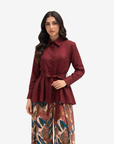 Close-up of the Crimson Elegance Pleated Linen Co-ord Set highlighting the pleated linen shirt, button-front design, detachable belt and premium craftsmanship.