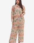 Front view of the Desert Palm Linen Blend Co-Ord Set by Gharza Couture featuring a button-down shirt, wide-leg trousers and palm print.