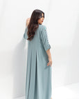 Three-quarter back view of Embroidered Butter Crepe Kaftan showing its full-length drape