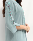 Sleeve detail of Embroidered Butter Crepe Kaftan showing the decorative floral embroidery