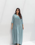 Front full-length view of embroidered kaftan featuring relaxed elbow-length sleeves
