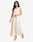 Full-length ivory crepe satin maxi dress with a graceful flowing silhouette, perfect as an inner dress for open abayas.