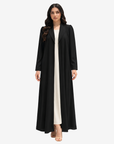 Luxury black open-front crepe abaya by Gharza Couture featuring a flowing silhouette and tailored shawl collar over a modest inner dress.
