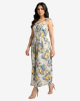 Side view of the Orchard Aviary Linen Blend Maxi Dress highlighting the lightweight drape and vibrant botanical print by Gharza Couture.