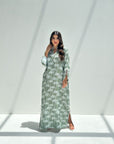 Women's sage green palm print linen blend jalabiya with side slit details and elegant modest silhouette