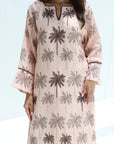 Front detail of Palm Sketch Jalabiya featuring a round embellished neckline and flared cuffs