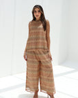 Full-length styled view of Sand Mosaic Lace Three-Piece Set showing its scalloped edging