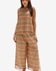 Front view of sleeveless mosaic-patterned top with coordinating wide-leg trousers