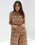 Close front view of sand mosaic sleeveless top and matching wide-leg trousers