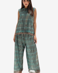 Full-length teal mosaic lace sleeveless top with matching wide-leg trousers