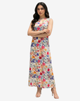 Luxury Wildflower Symphony silk blend floral dress featuring colorful botanical print and timeless sleeveless design.