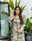 Amara Palm Jalabiya featuring elegant green and gold palm print