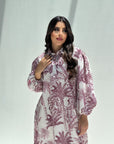 Close-up of rose botanical print linen blend fabric on luxury women's jalabiya