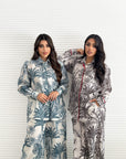 Close-up of the tropical palm print detail on the Palm Royale Travel Wear Set.