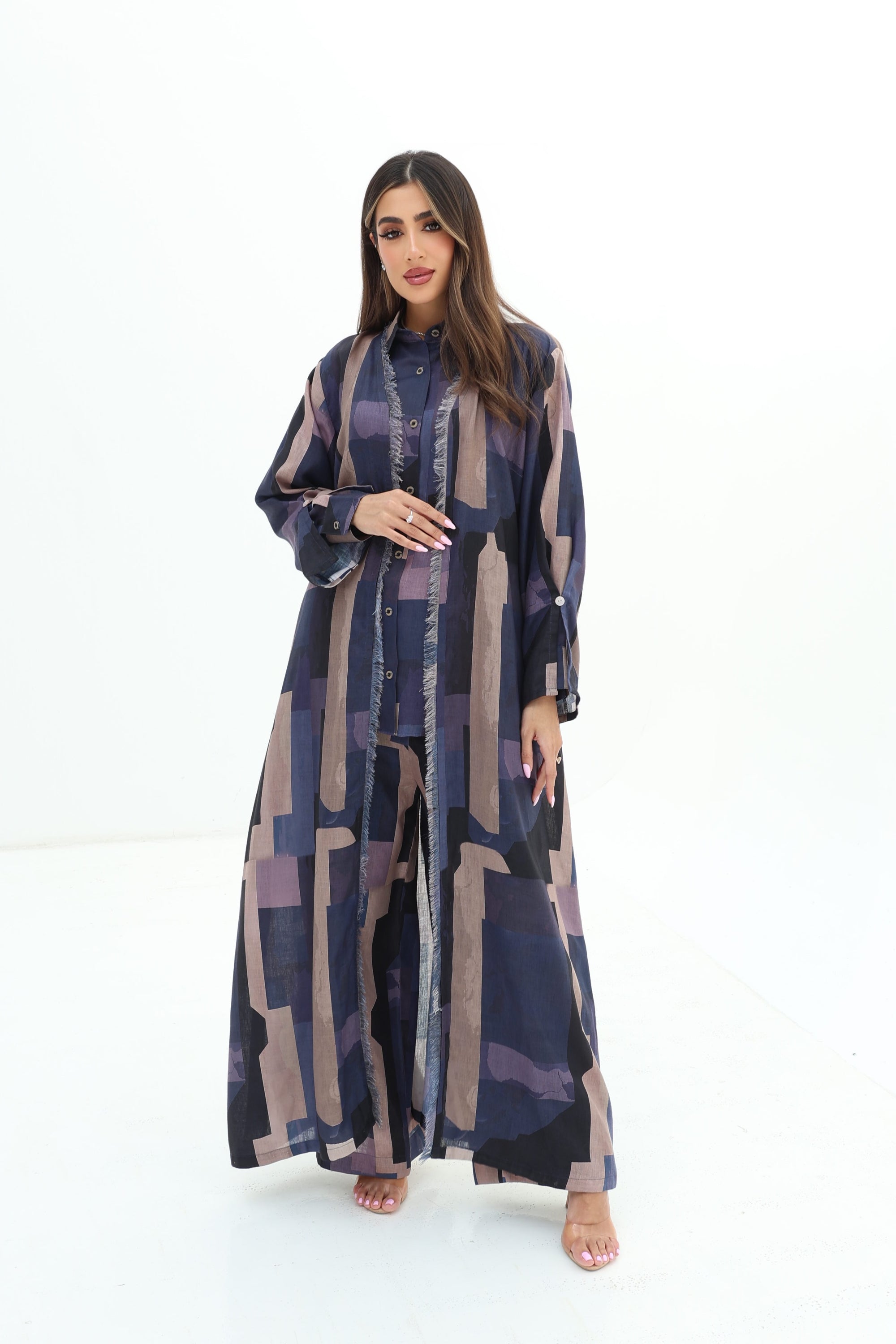 Full-length view of Abstract Block Print Linen Blend Open Abaya layered over matching shirt and trousers by Gharza Couture