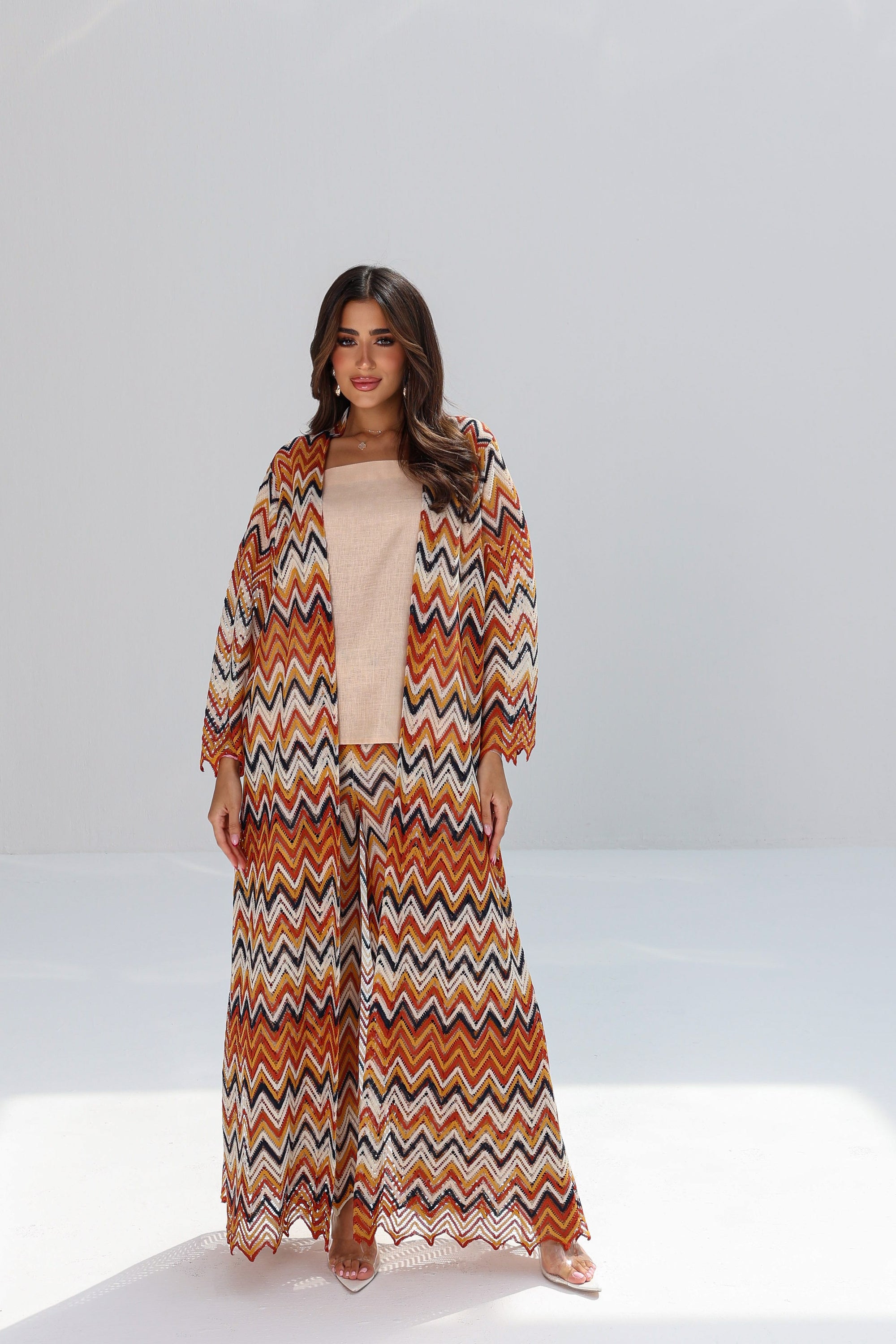 Full-length Amber Chevron Set styled with printed outer layer and wide-leg trousers