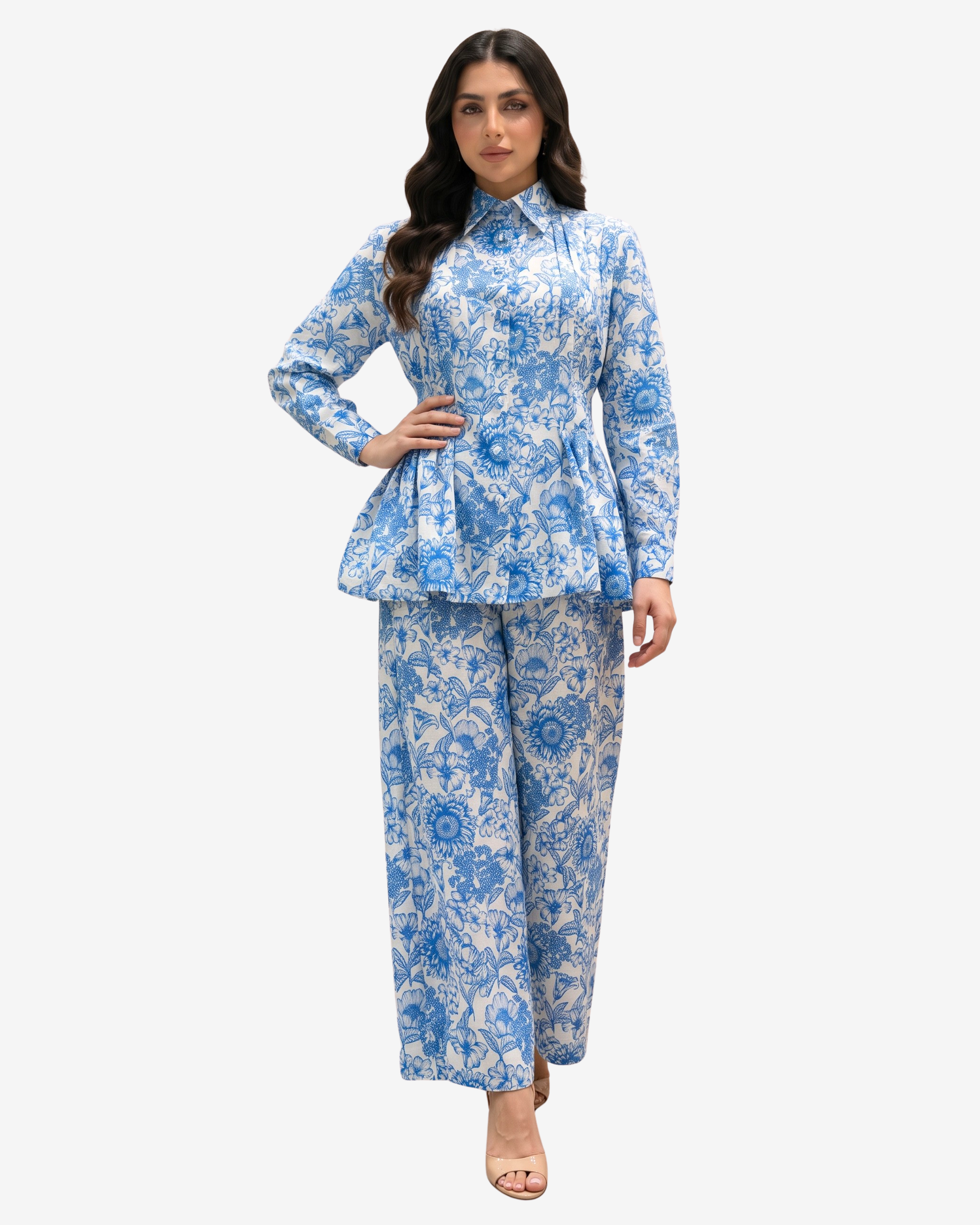Three-quarter view of the Azure Blossom Pleated Linen Co-ord Set showcasing the pleated floral linen top, wide-leg trousers and premium botanical print.