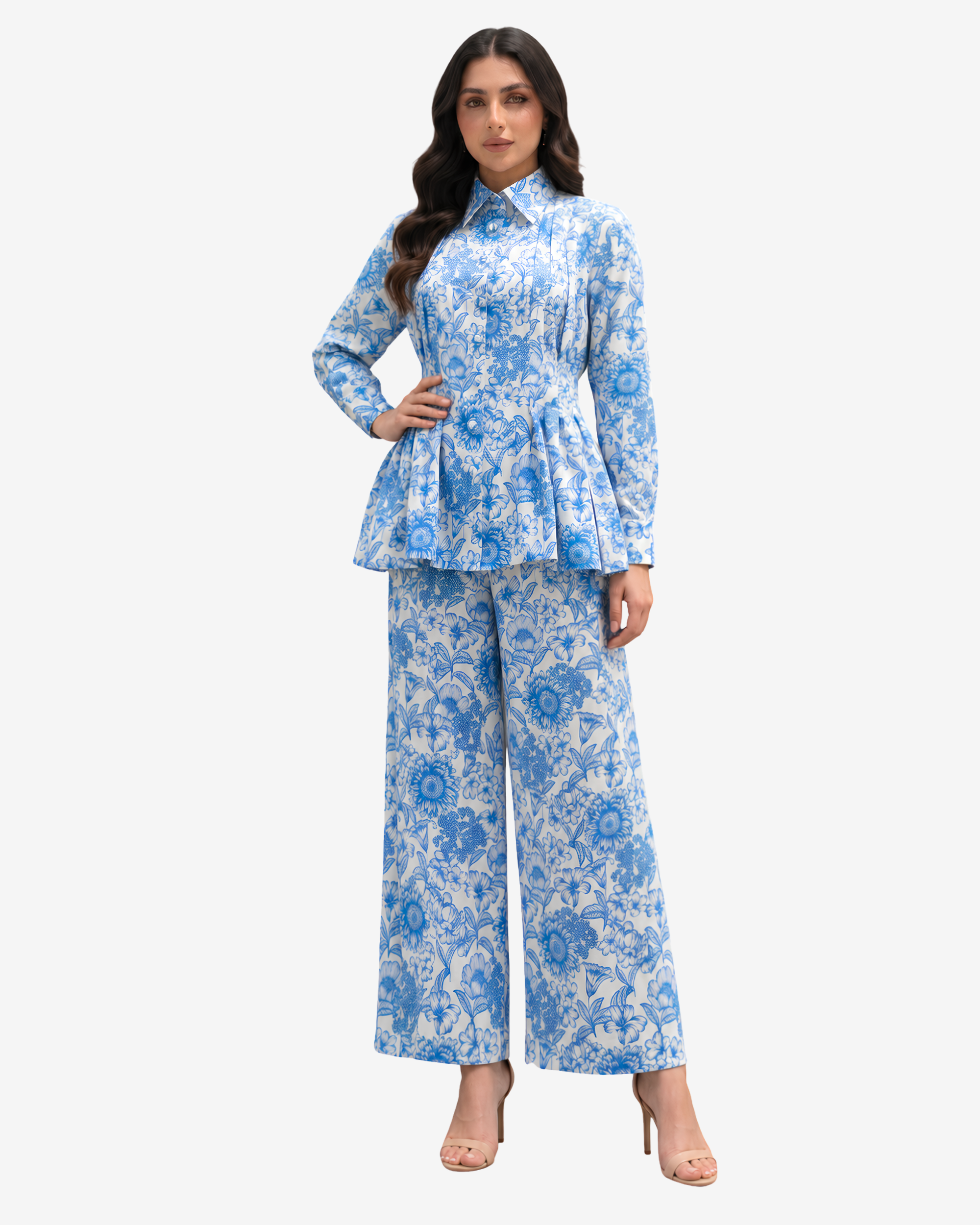 Azure Blossom Pleated Linen Co-ord Set styled from an angled front view, featuring a tailored pleated linen top and matching floral wide-leg trousers by Gharza Couture.