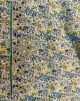 Premium Japanese printed cotton fabric showcasing the Beige Wildflower Cotton Mukhawar with delicate botanical floral print for custom tailoring.
