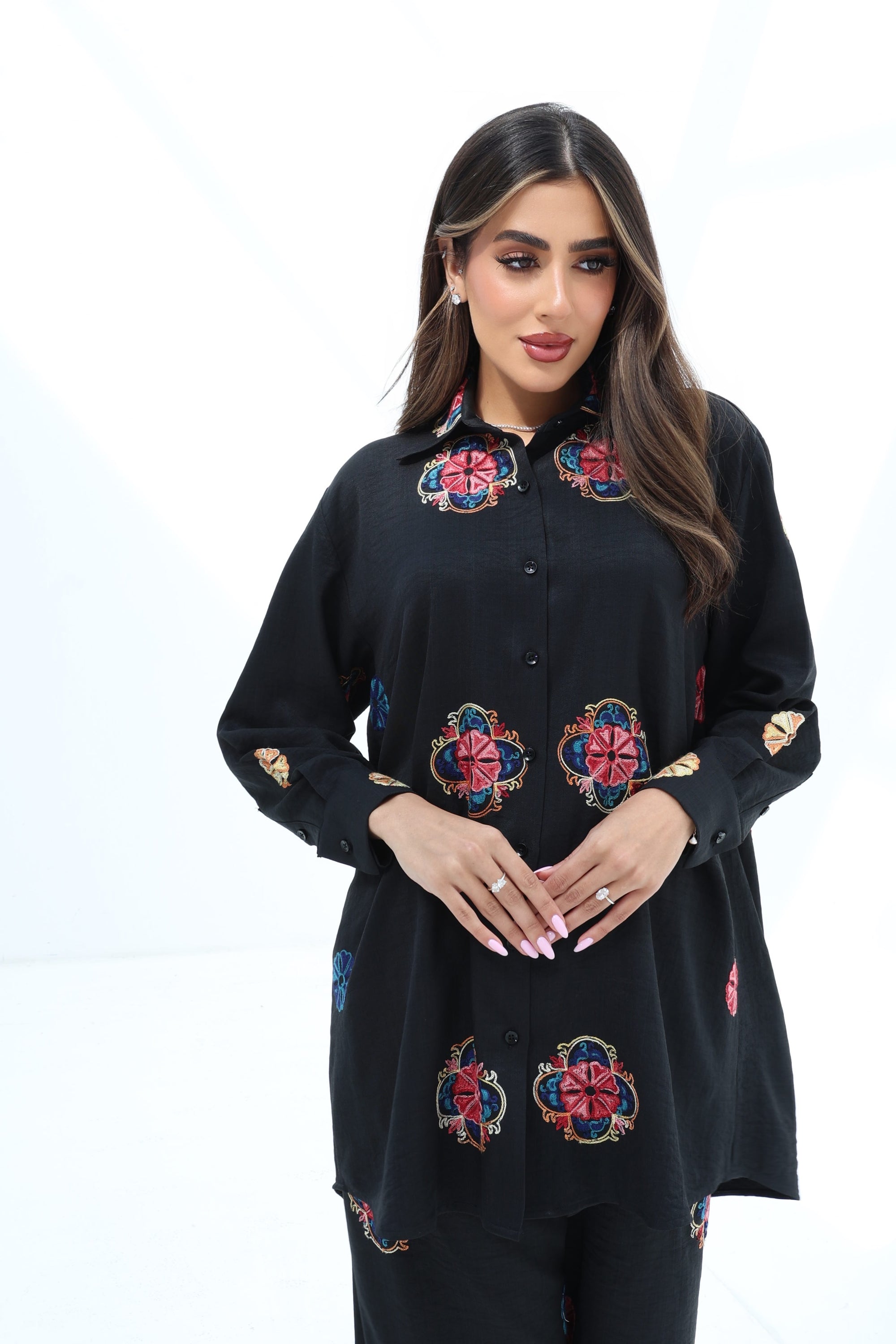 Portrait of the Black Floral Medallion Cotton Mix Co-ord Set with elegant floral medallion print, relaxed silhouette and elastic waist trousers.