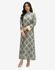 Luxury modest cotton chiffon dress featuring a timeless blue heritage print, lightweight fabric, and graceful silhouette.