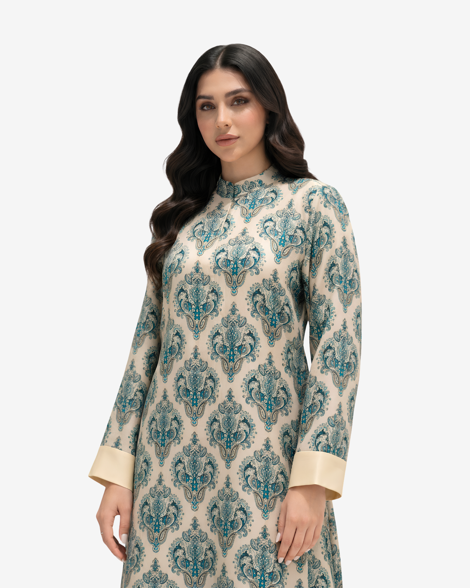 Close-up of the blue heritage print, high neckline, premium cotton chiffon fabric, and contrast cuff details by Gharza Couture.