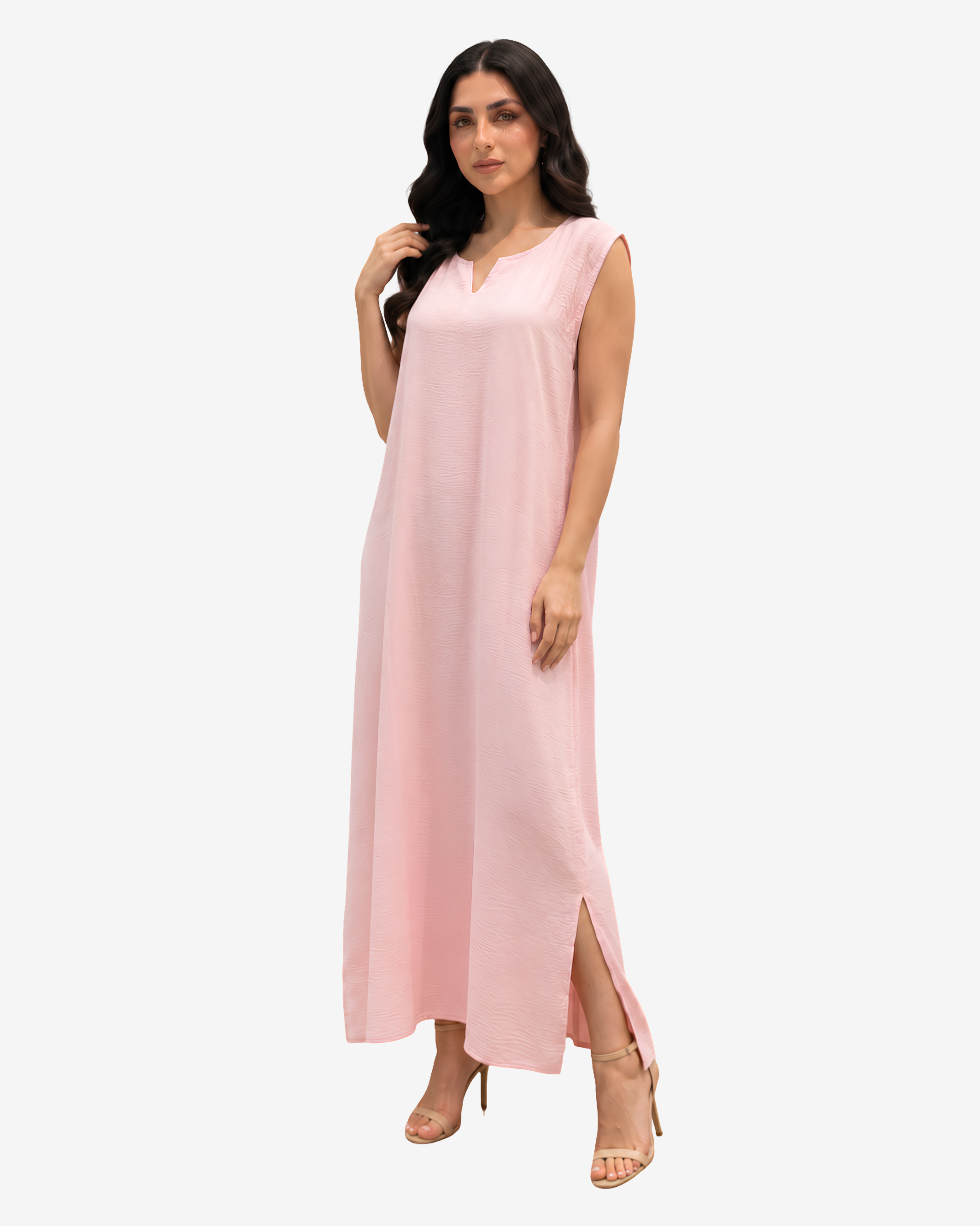 Women's blush pink sleeveless crepe satin maxi dress with side slits, designed as an elegant inner dress for open abayas and modest fashion.