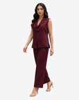 Women's burgundy sleeveless co-ord set with tailored vest and straight-leg trousers in a modern modest style