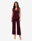 Elegant burgundy two-piece outfit with sleeveless tailored top and matching pants by Gharza Couture