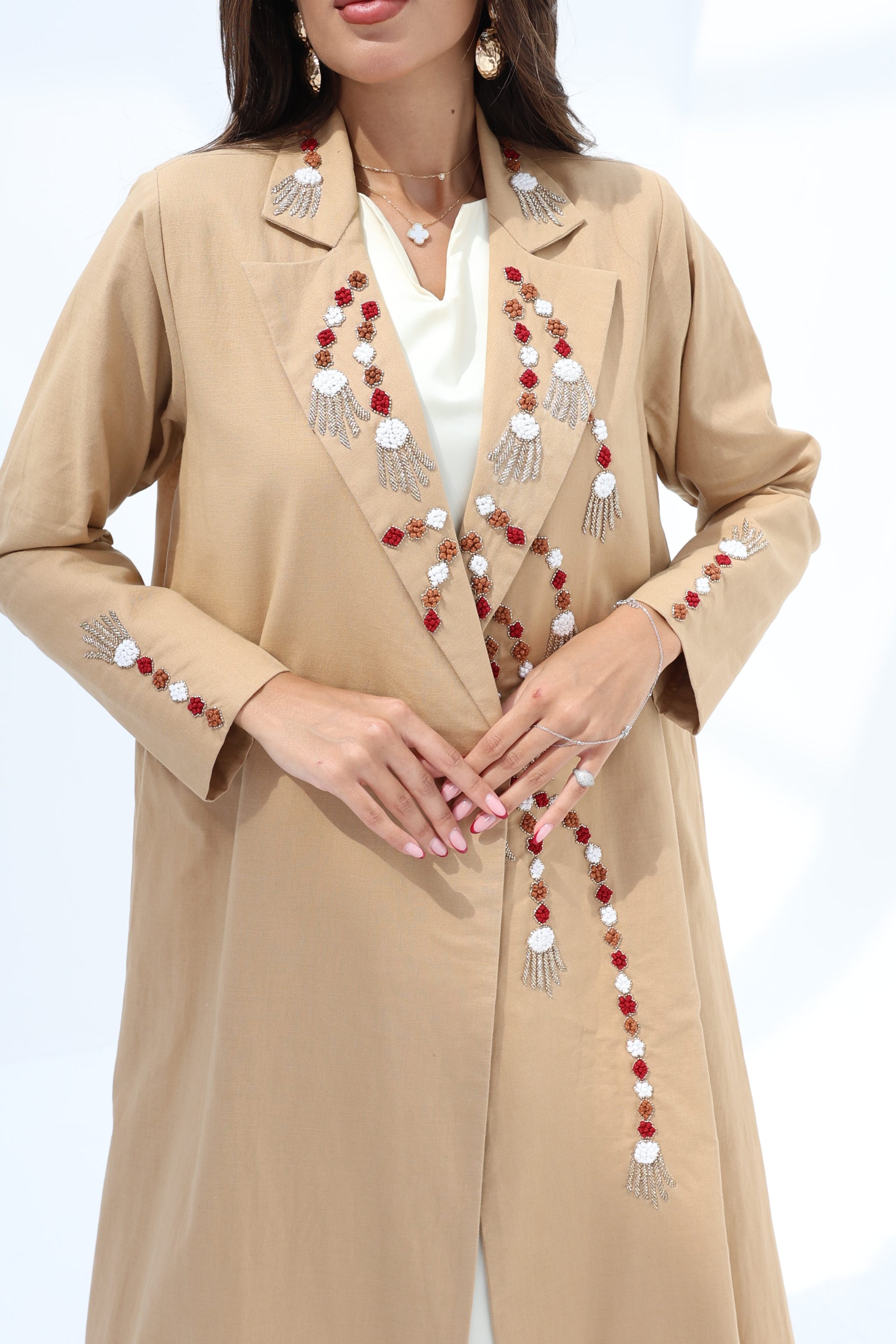 Camel Hand Embellished Abaya showing V-neckline, front detailing and embellished cuffs