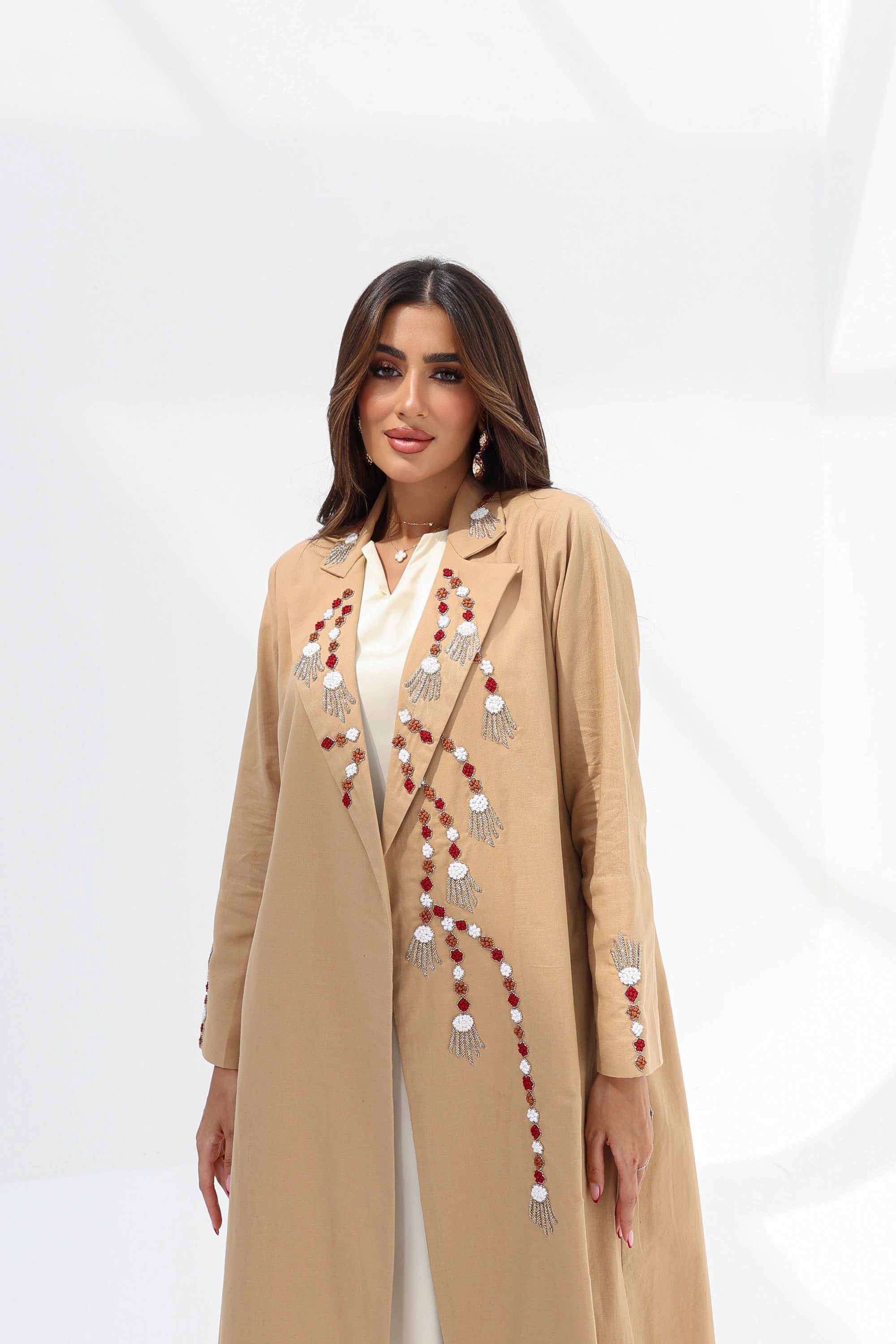 Camel linen blend abaya with colourful hand embellishments and long sleeves