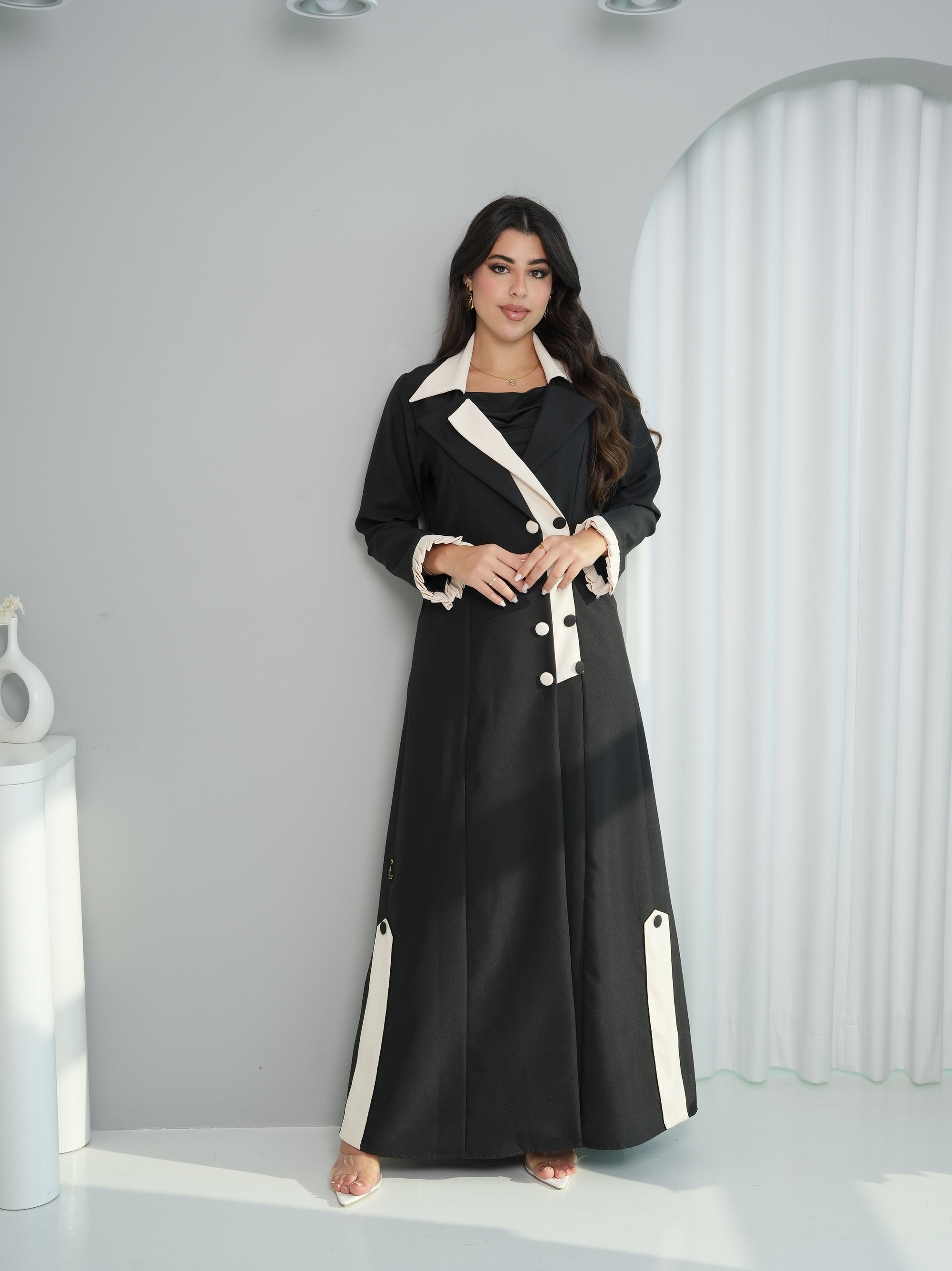 Full-length view of Contrast Lapel Abaya styled open with elegant contrast cuffs by Gharza Couture