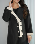 Close-up of Contrast Lapel Suit Abaya highlighting the asymmetric ivory lapel and double-breasted buttons