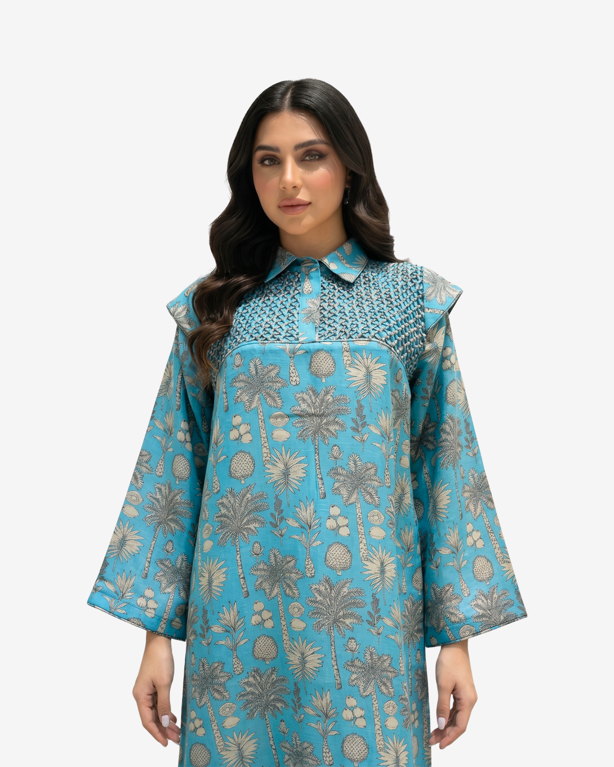 Close-up of the hand embellished yoke, shirt collar and flounce shoulders on the Coral Oasis linen blend jalabiya