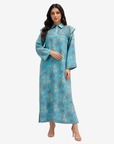 Front view of Coral Oasis luxury linen blend jalabiya featuring hand embellishment and flounce shoulders