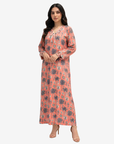 Side view of Coral Oasis luxury linen blend jalabiya with botanical palm print