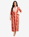 Full-length Crimson Blossom belted linen blend jalabiya featuring a pleated front panel and floral print