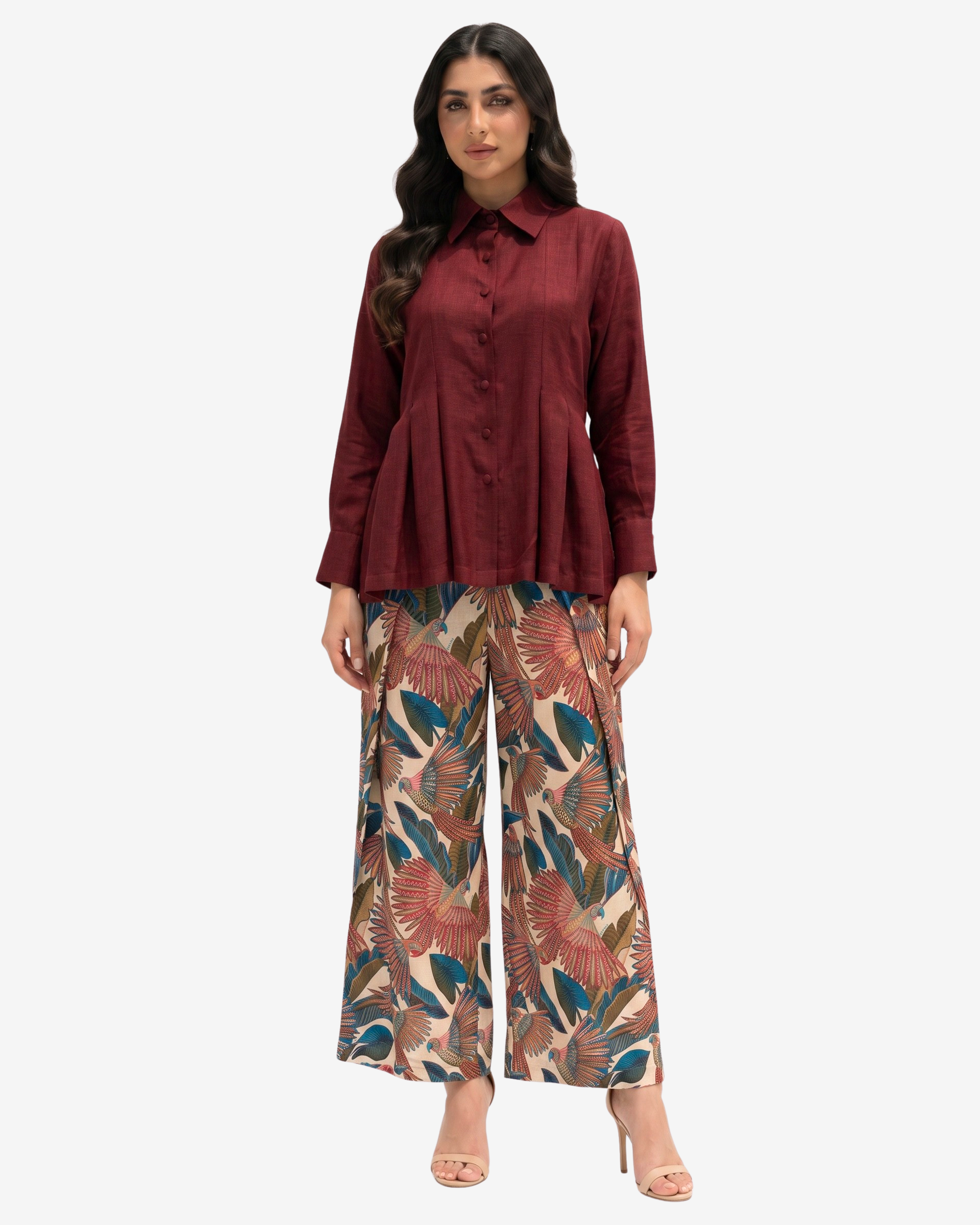 Crimson Elegance Pleated Linen Co-ord Set featuring a pleated long-sleeve linen top and botanical print lined wide-leg trousers with an elastic waistband by Gharza Couture.