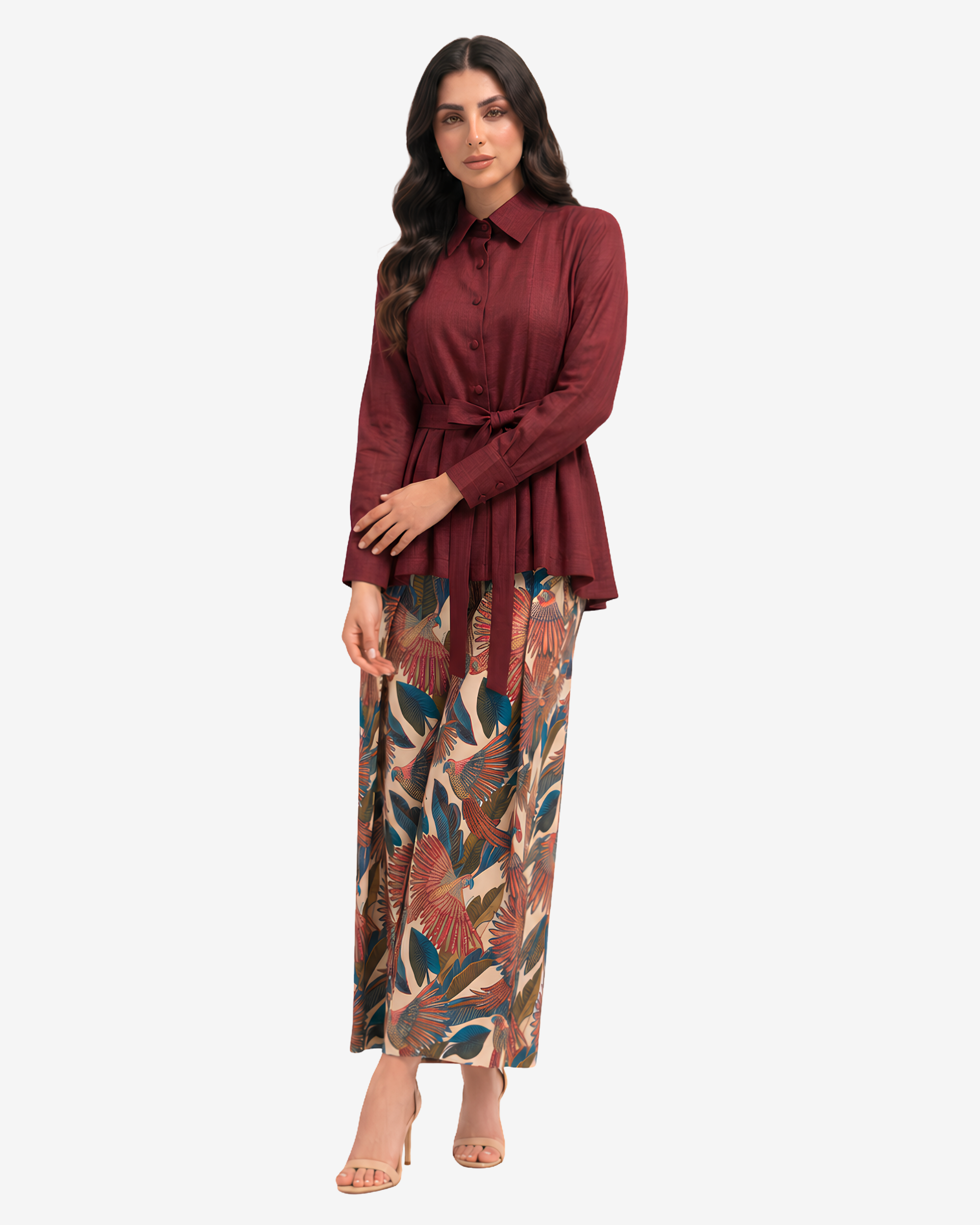Three-quarter view of the Crimson Elegance Pleated Linen Co-ord Set showcasing the tailored pleated linen top and botanical print wide-leg trousers.