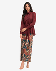 Three-quarter view of the Crimson Elegance Pleated Linen Co-ord Set showcasing the tailored pleated linen top and botanical print wide-leg trousers.