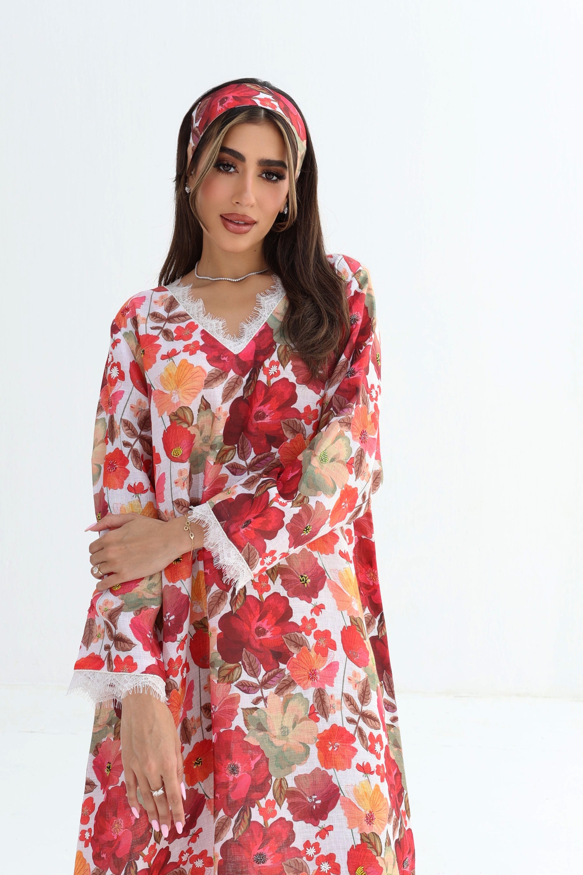 Crimson Bloom Lace Trim Jalabiya showing neckline, floral print and hand embellishment