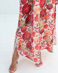 Crimson Bloom Jalabiya hem detail showing vibrant floral print and lace trim
