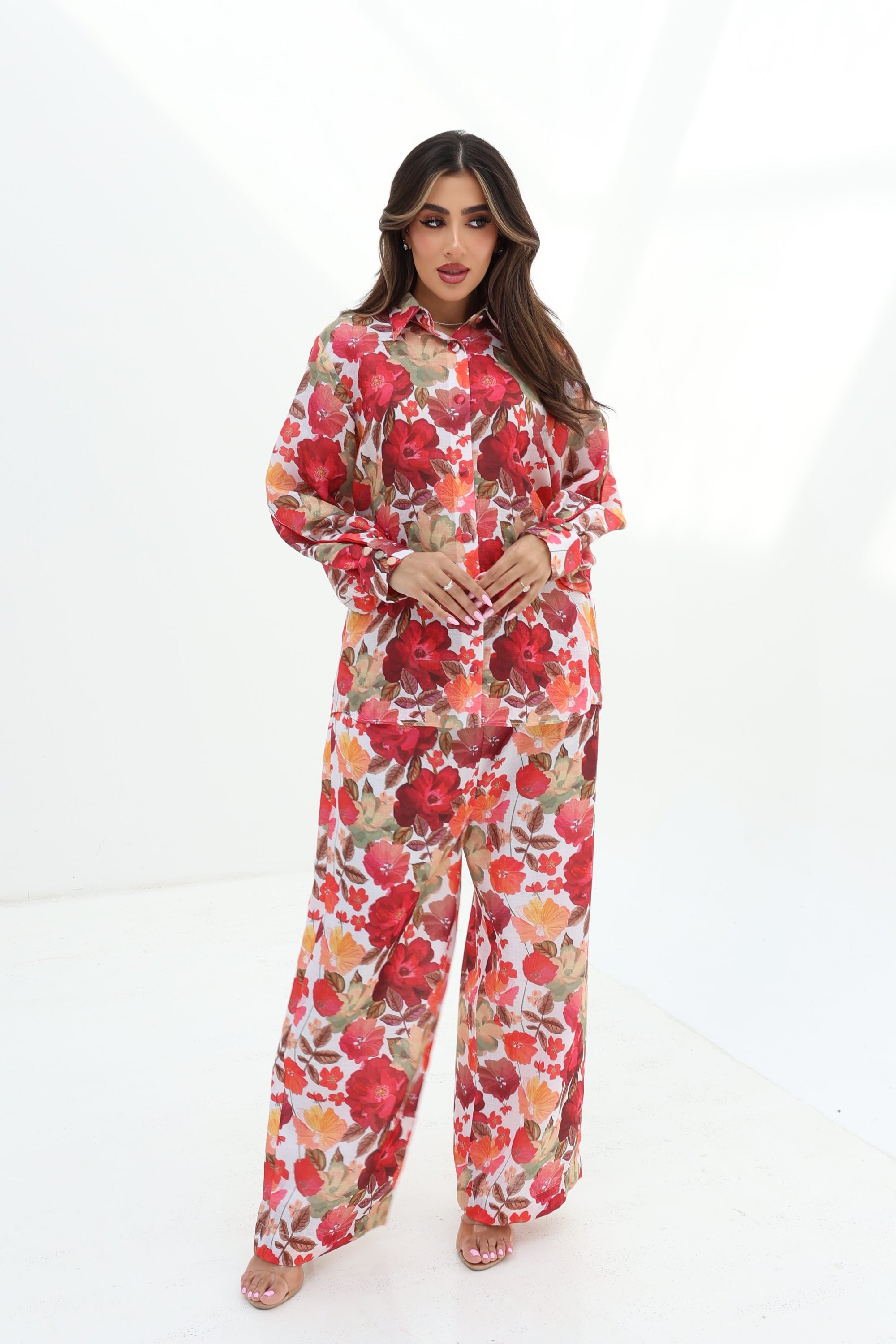 Walking view of the Crimson Bloom Linen Blend Co-Ord Set with wide-leg trousers and elegant floral print by Gharza Couture.