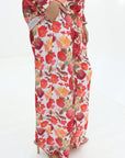 Close-up of the Crimson Bloom Linen Blend Co-Ord Set featuring lined wide-leg trousers with a vibrant floral print.